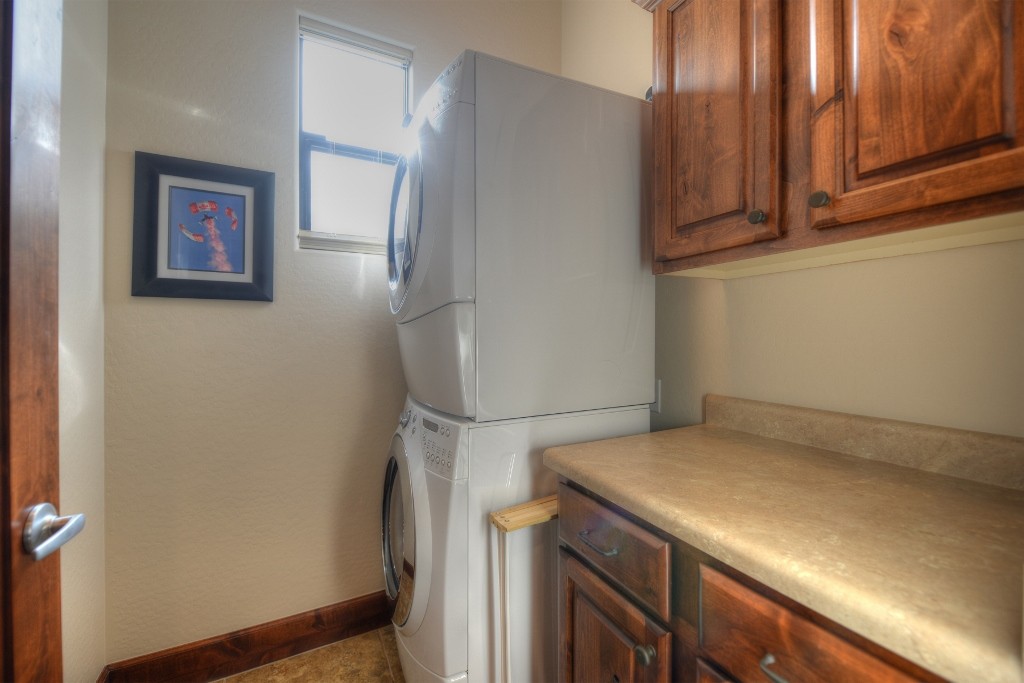 Laundry room with full-size, stackable washer and dryer