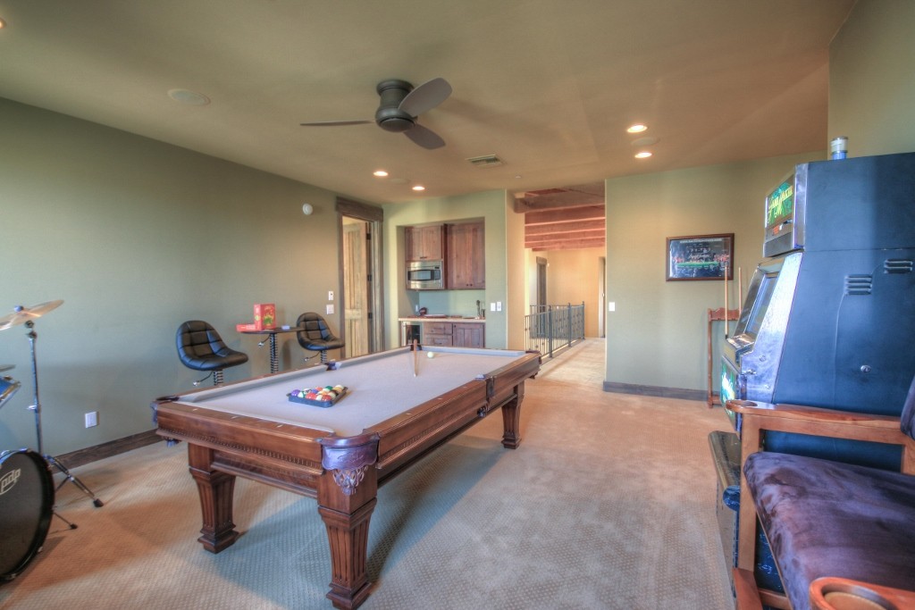 Upstairs game room with wet bar