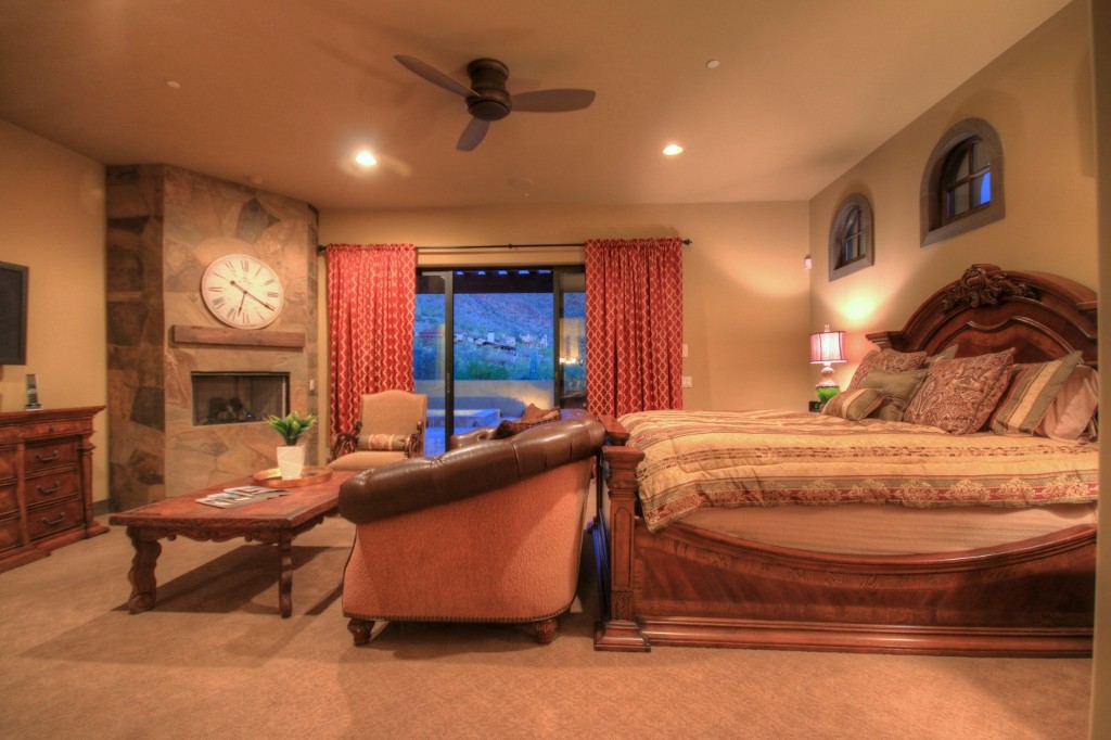 Master bedroom with fireplace and pocket doors