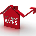 The Fed hints that interest rates may be on the rise.
