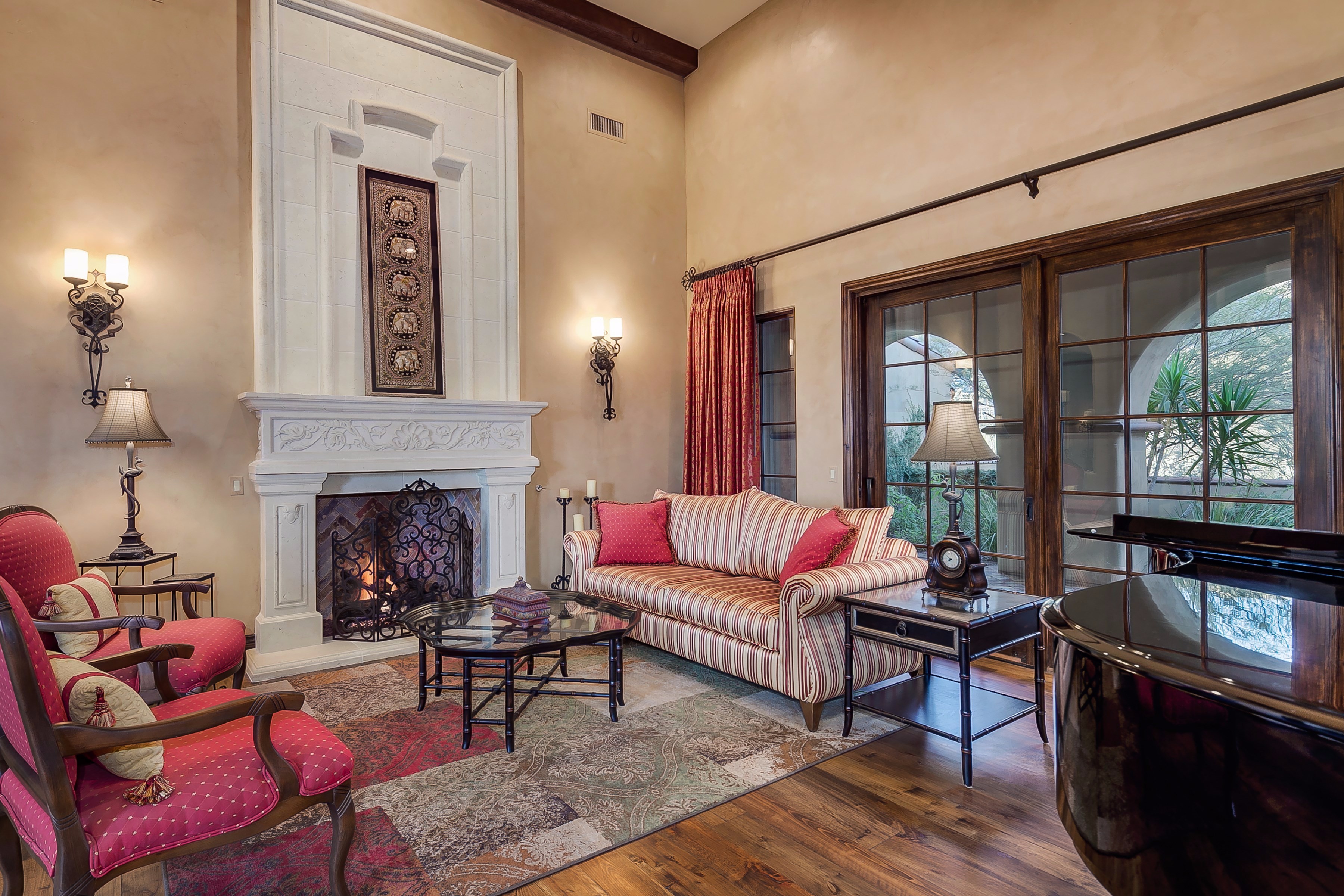 Fireplace in formal living room at this Scottsdale home for sale in Silverleaf located at 10744 E Wingspan Way #1665 Scottsdale, AZ 85255 listed by Don Matheson at The Matheson Team