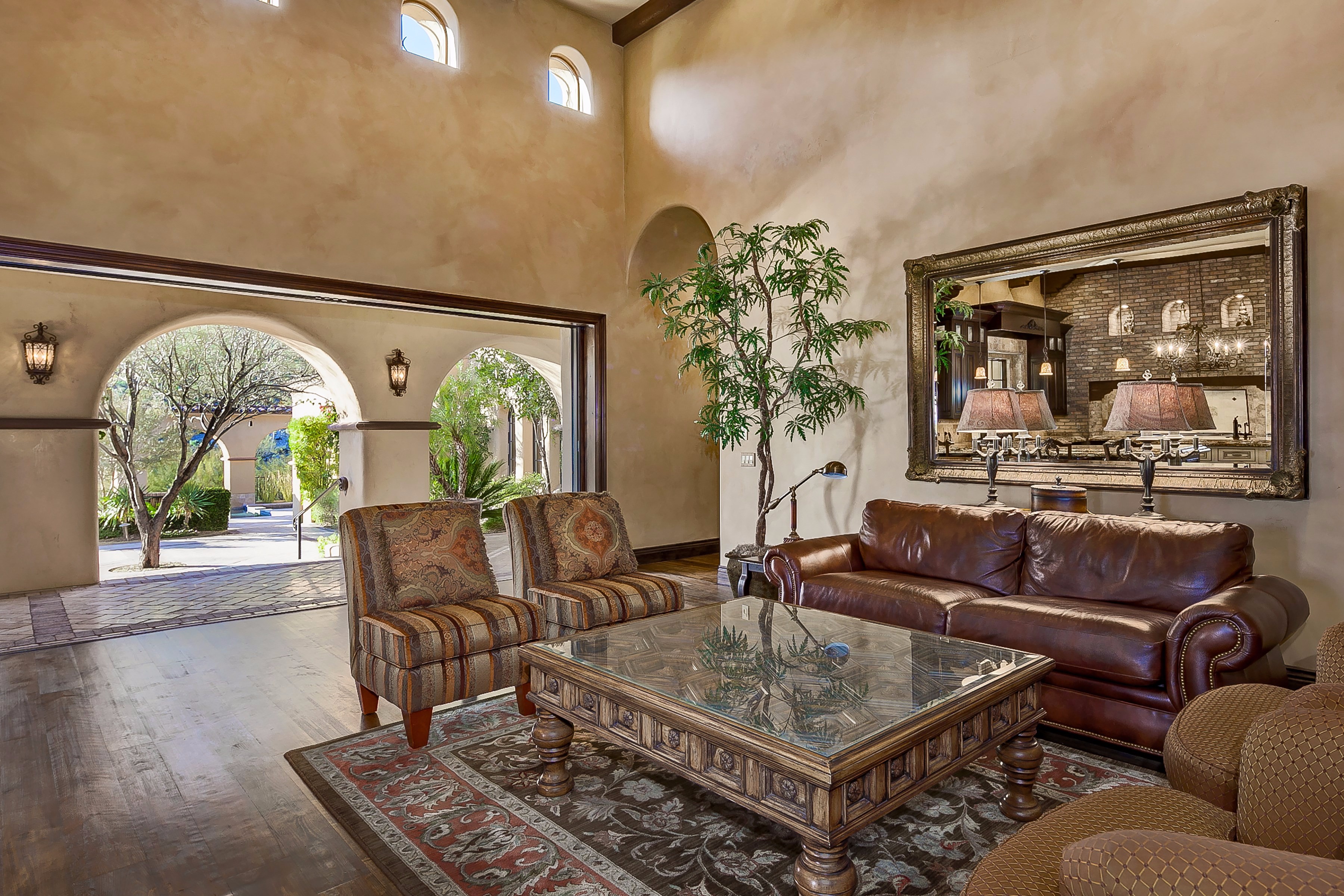 Family room with pocket doors at this Scottsdale home for sale in Silverleaf located at 10744 E Wingspan Way #1665 Scottsdale, AZ 85255 listed by Don Matheson at The Matheson Team