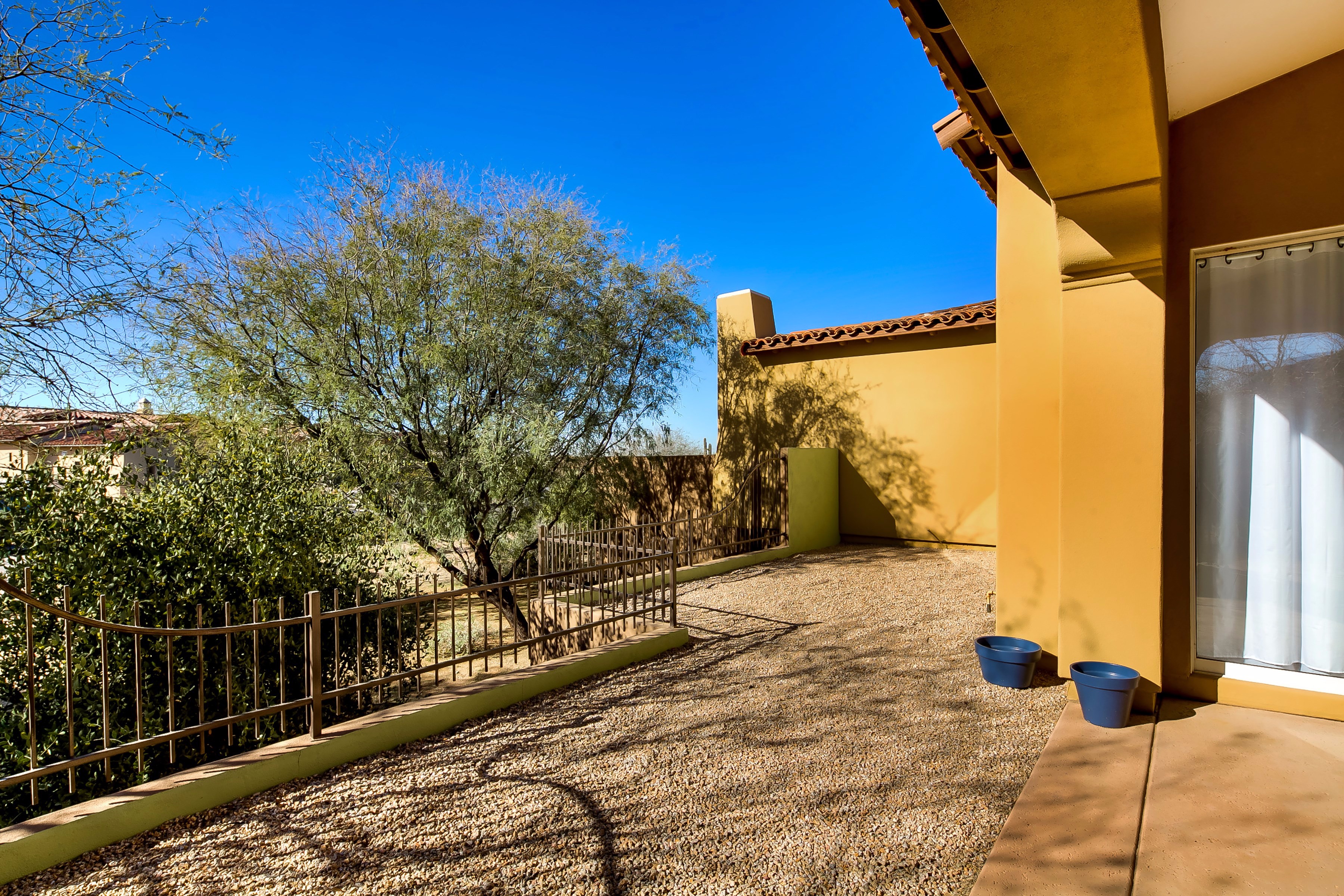 Low-maintenance landscaping at this Scottsdale home for sale in DC Ranch located at 8867 E Mountain Spring Rd Scottsdale, AZ 85255 listed by Don Matheson at The Matheson Team