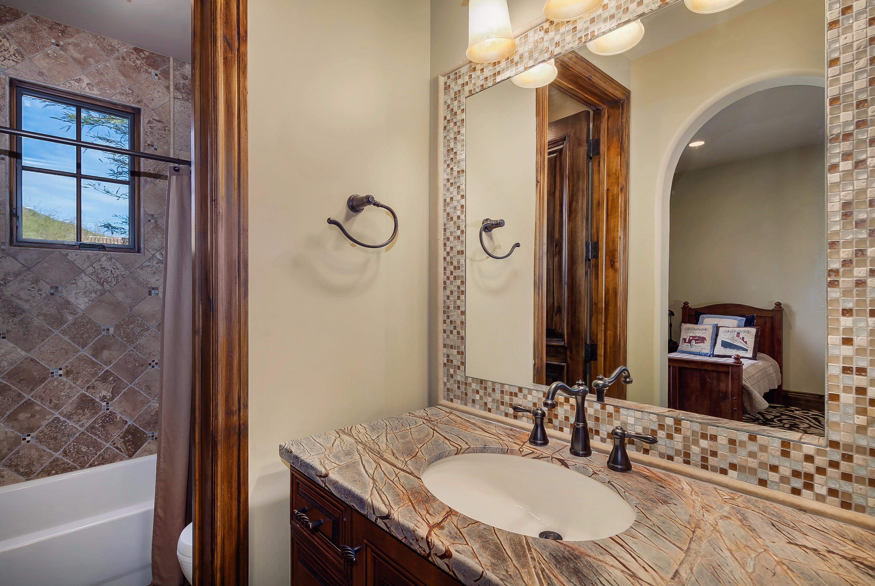 Full en-suite guest bath at this Scottsdale home for sale in Silverleaf located at 10744 E Wingspan Way #1665 Scottsdale, AZ 85255 listed by Don Matheson at The Matheson Team