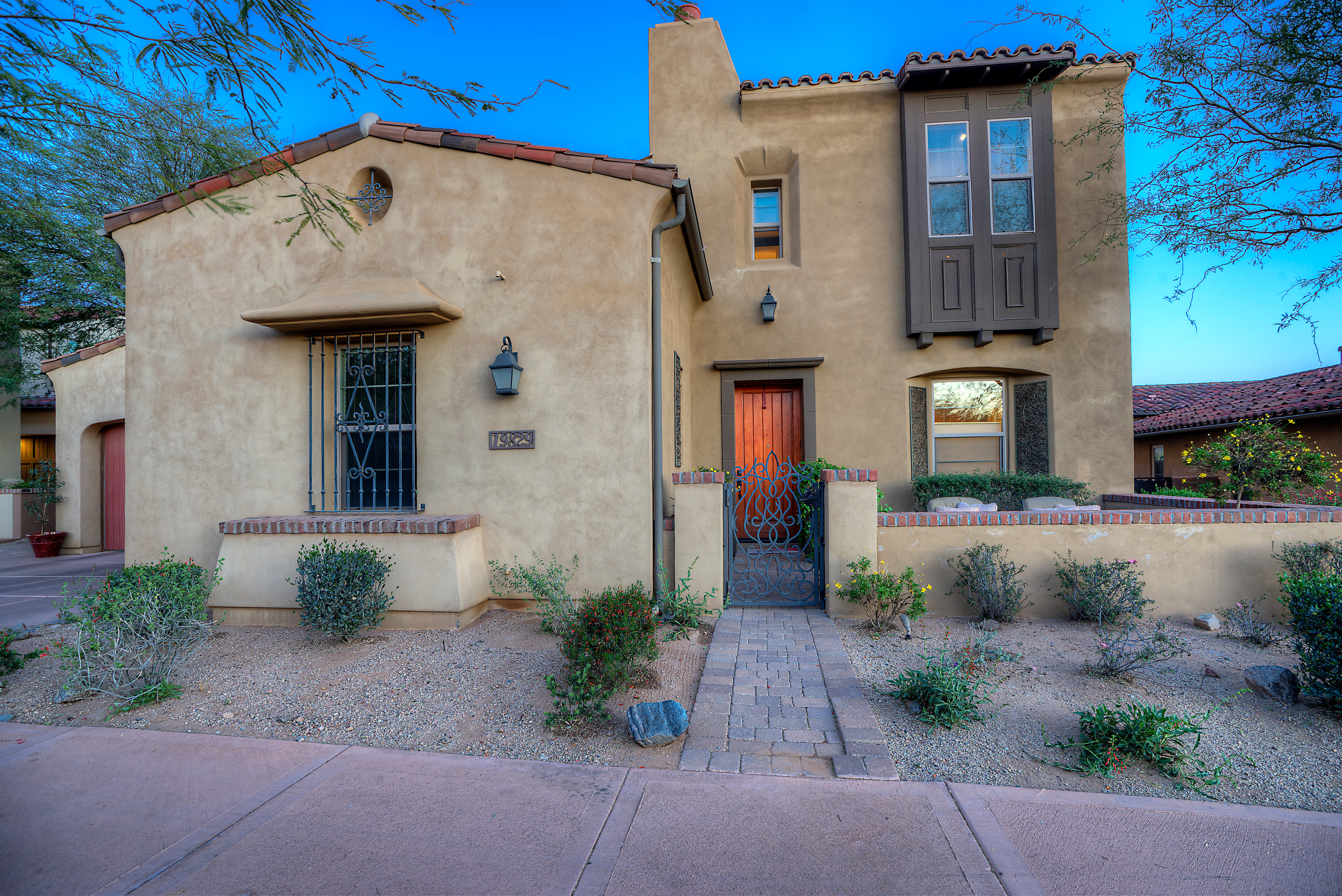 Front exterior at this Scottsdale home for sale in DC Ranch located at 19829 N 97th Pl Scottsdale, AZ 85255 listed by Don Matheson at The Matheson Team