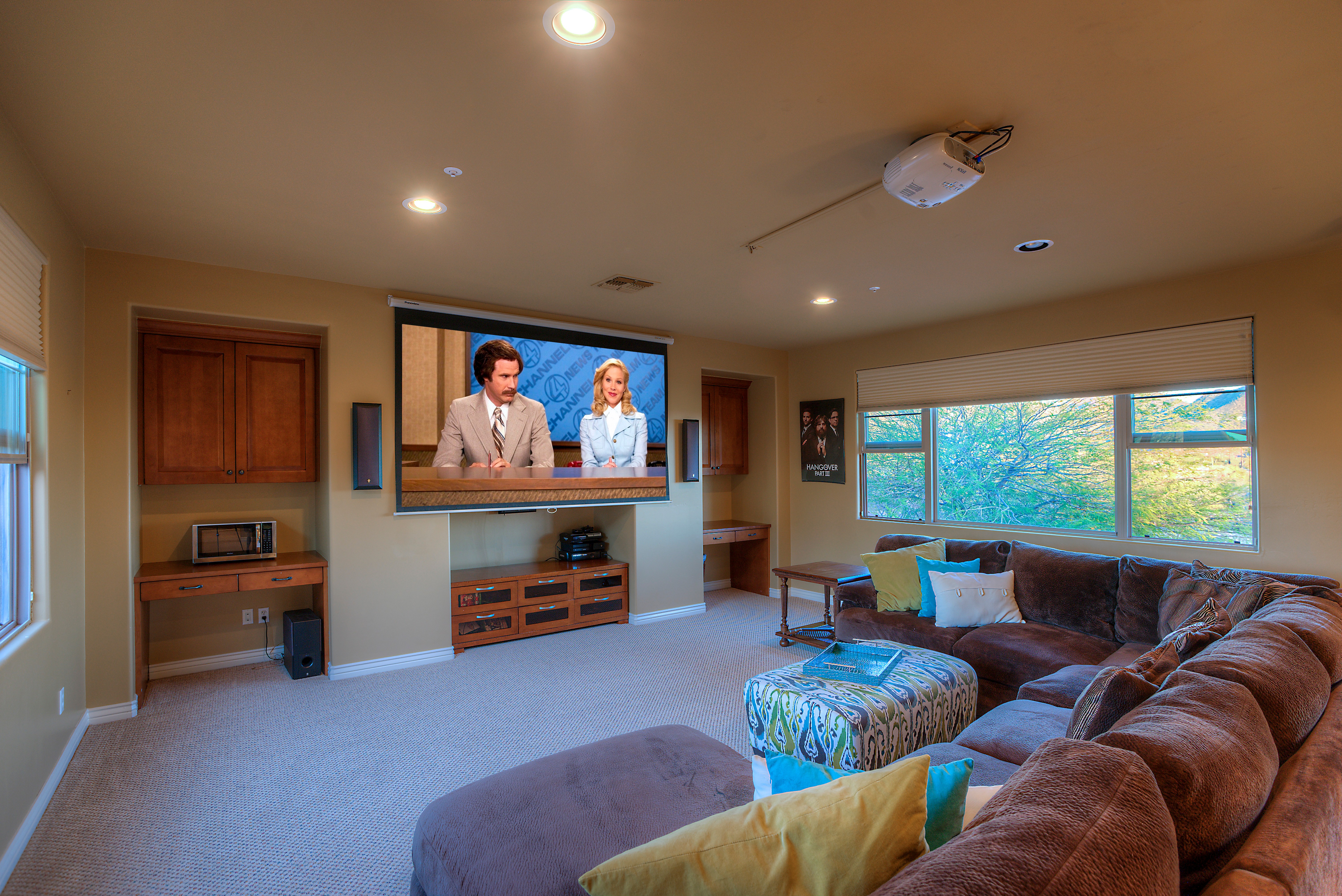 Roll-down screen and projector at this Scottsdale home for sale in DC Ranch located at 19829 N 97th Pl Scottsdale, AZ 85255 listed by Don Matheson at The Matheson Team
