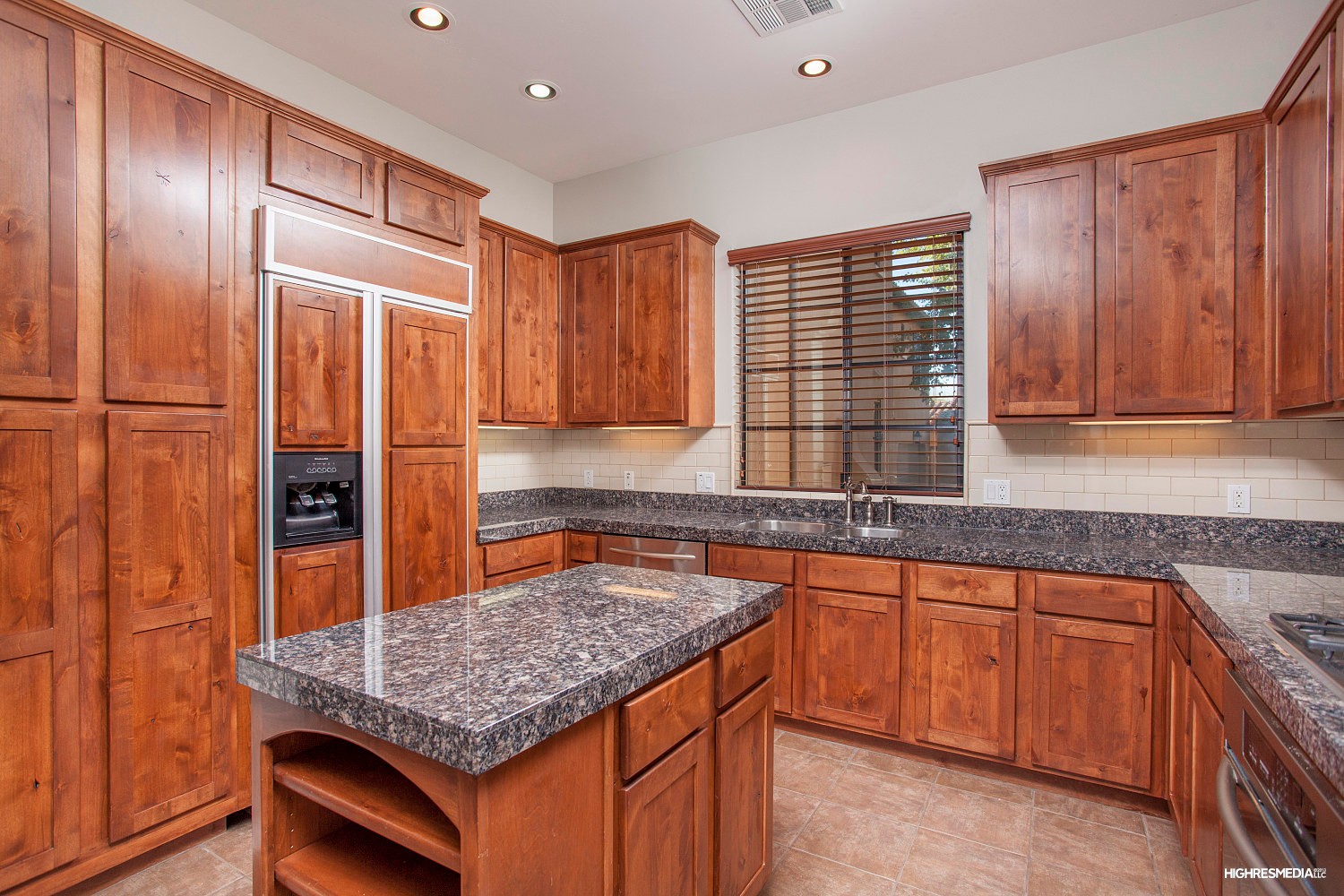 Knotty Alder cabinetry at this Scottsdale townhome for sale in Market Street at DC Ranch located at 20704 N 90th Pl #1005 Scottsdale, AZ 85255 listed by Don Matheson at The Matheson Team