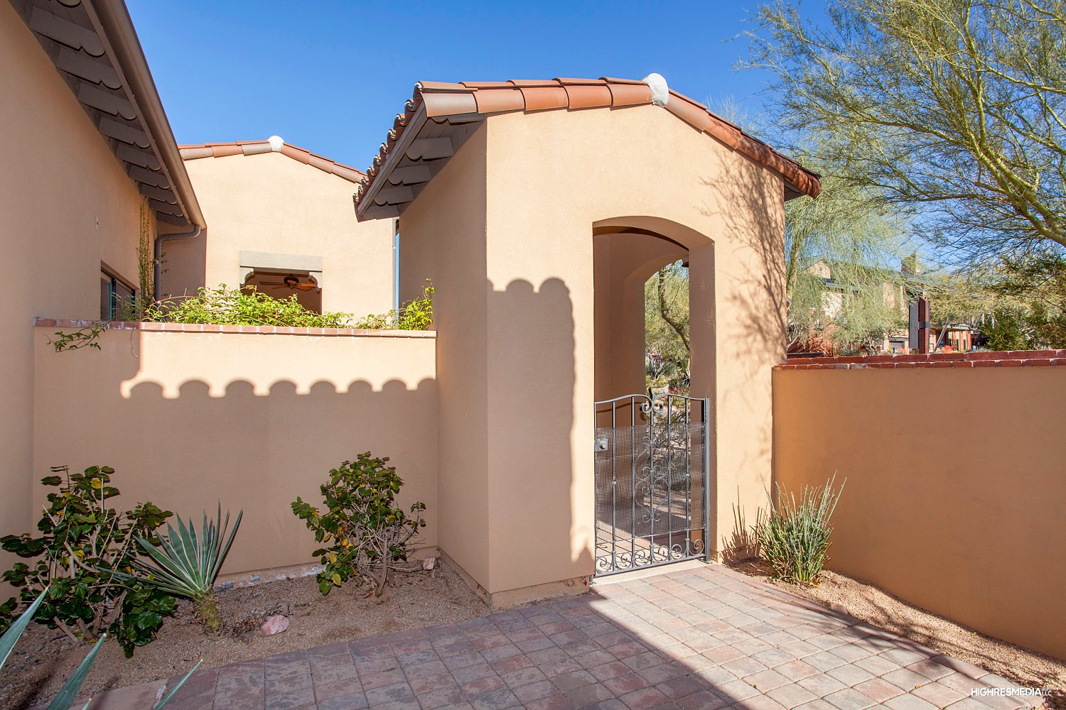 Gated entry to back patio at this Scottsdale townhome for sale in Market Street at DC Ranch located at 20704 N 90th Pl #1005 Scottsdale, AZ 85255 listed by Don Matheson at The Matheson Team