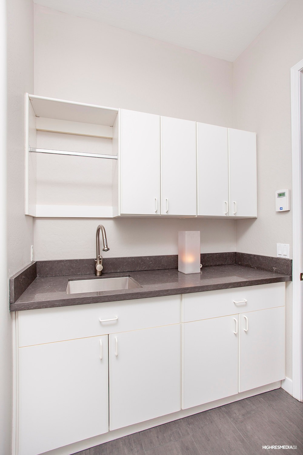 Sleek laundry room at this Scottsdale home for sale in DC Ranch located at 20421 N 96th Way Scottsdale, AZ 85255 listed by Don Matheson at The Matheson Team
