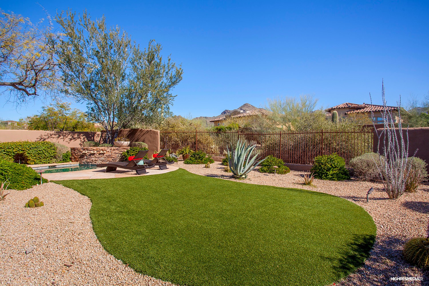 Low-maintenance landscaping at this Scottsdale home for sale in DC Ranch located at 20421 N 96th Way Scottsdale, AZ 85255 listed by Don Matheson at The Matheson Team