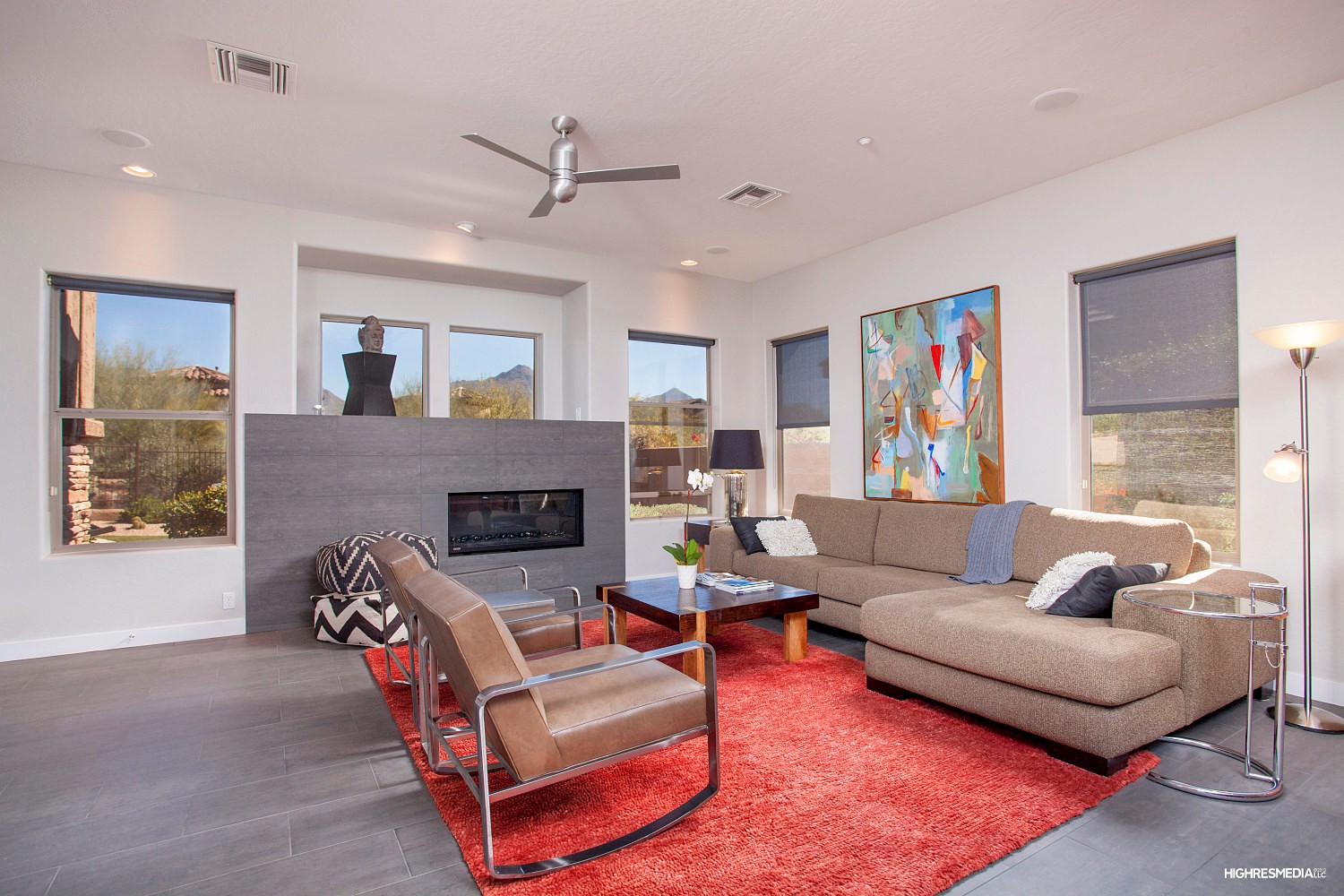 Family room with new fireplace at this Scottsdale home for sale in DC Ranch located at 20421 N 96th Way Scottsdale, AZ 85255 listed by Don Matheson at The Matheson Team
