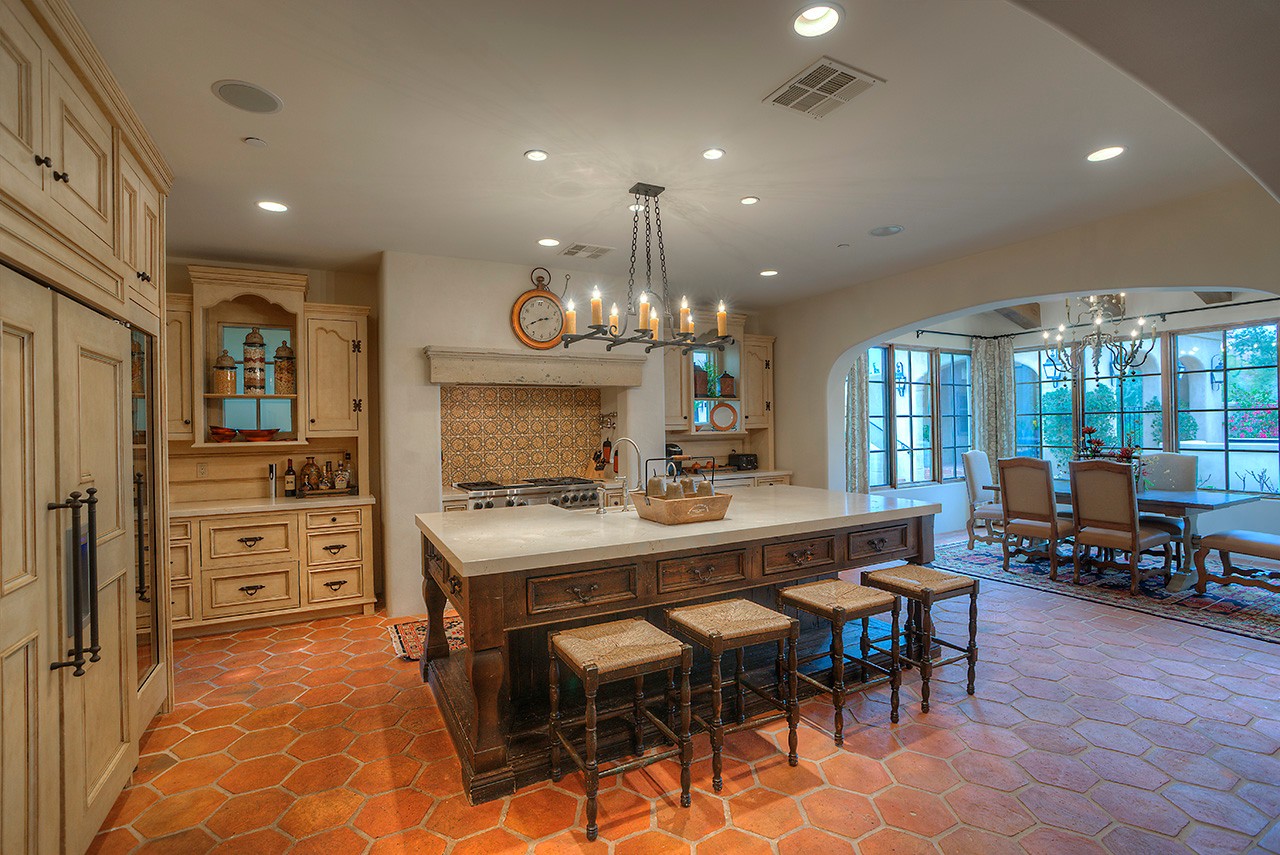 Antique kitchen island at this Scottsdale home for sale located at 9290 E Thompson Peak Pkwy #455 Scottsdale, AZ 85255 listed by Don Matheson at The Matheson Team