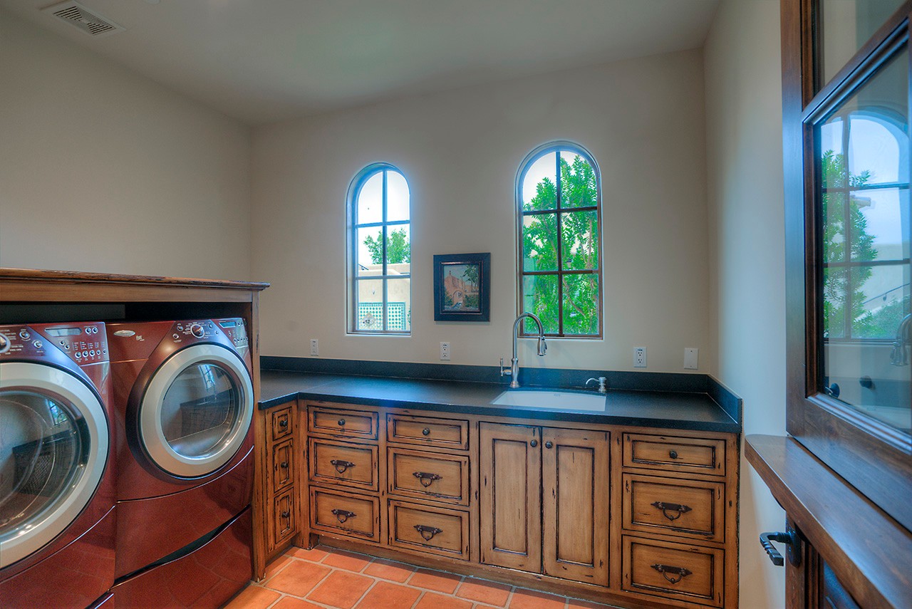 Laundry room with sink at this Scottsdale home for sale located at 9290 E Thompson Peak Pkwy #455 Scottsdale, AZ 85255 listed by Don Matheson at The Matheson Team