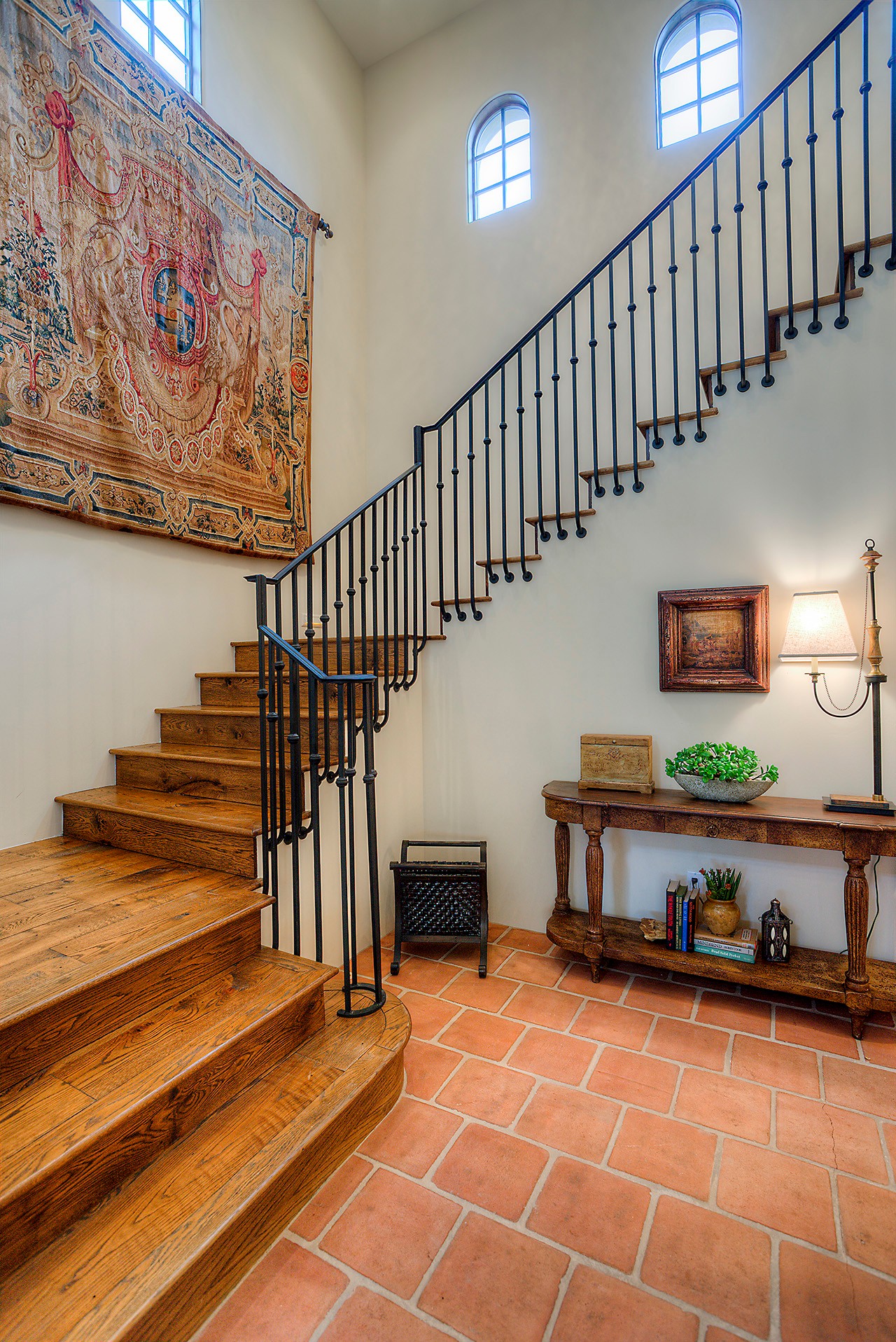 Iron-railed staircase at this Scottsdale home for sale located at 9290 E Thompson Peak Pkwy #455 Scottsdale, AZ 85255 listed by Don Matheson at The Matheson Team