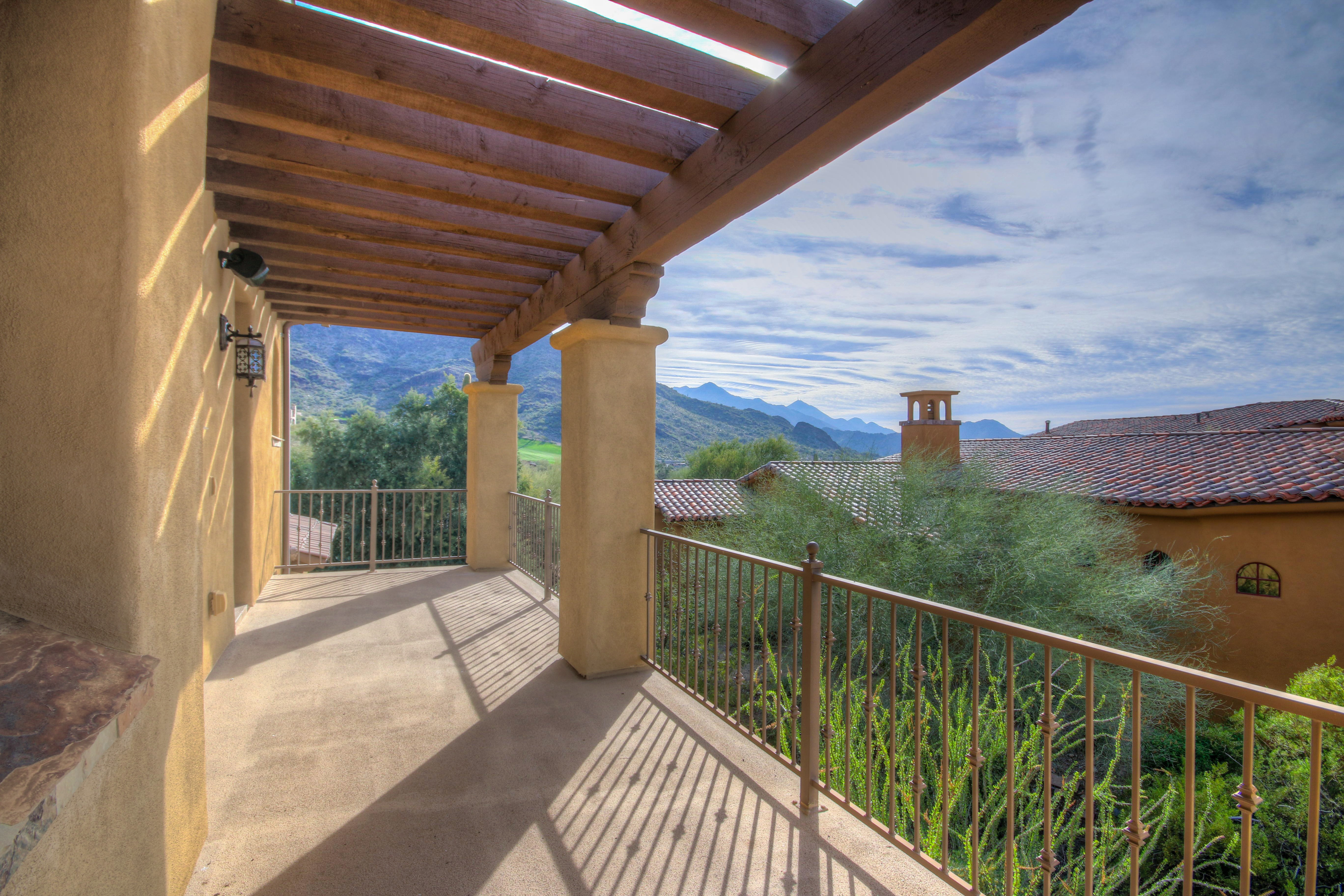 Mountain views from side balcony in this DC Ranch home for sale located at 9820 E Thompson Peak Pkwy #620, Scottsdale, AZ 85255 listed by Don Matheson