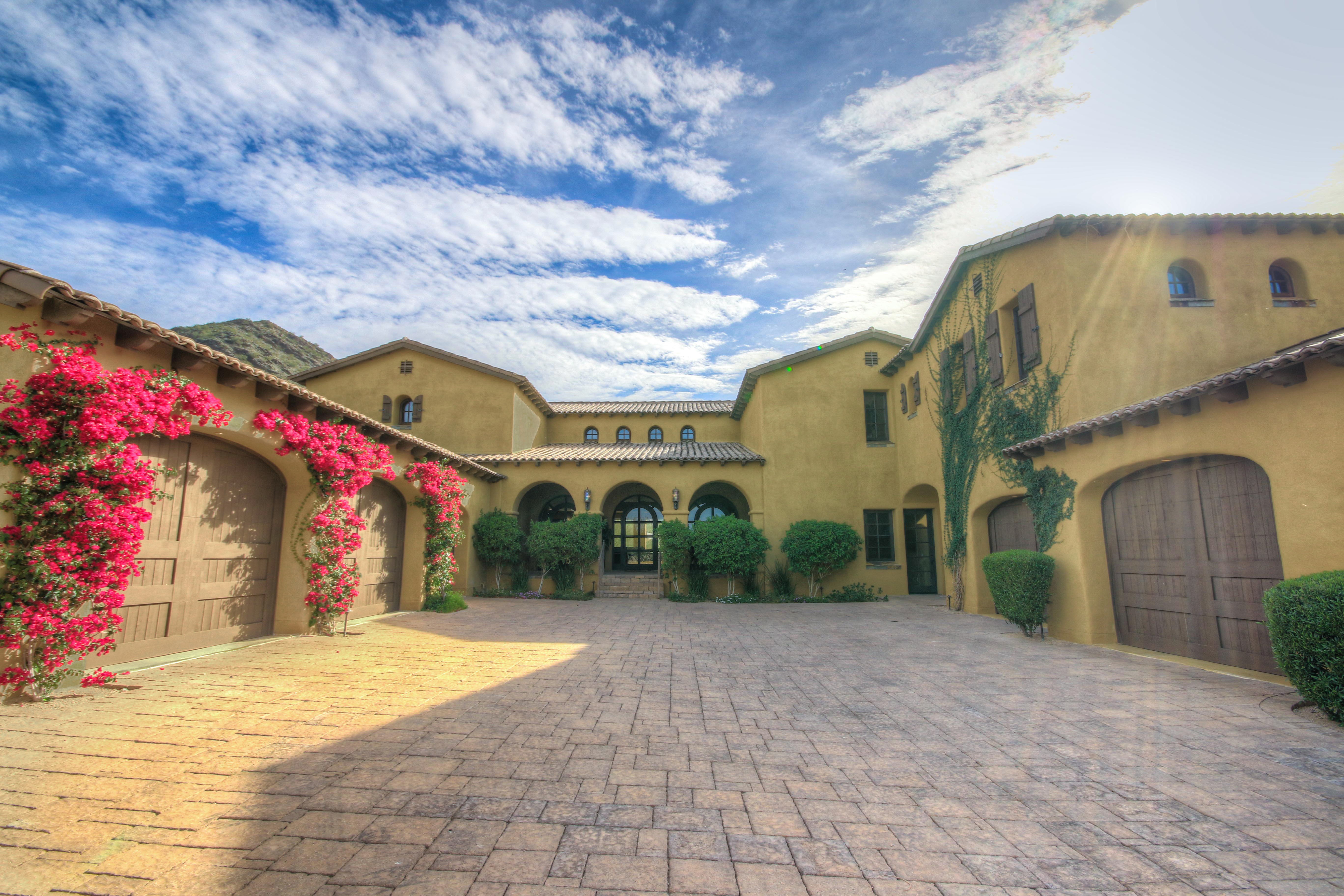 Driveway and front arches in this DC Ranch home for sale located at 9820 E Thompson Peak Pkwy #620, Scottsdale, AZ 85255 listed by Don Matheson