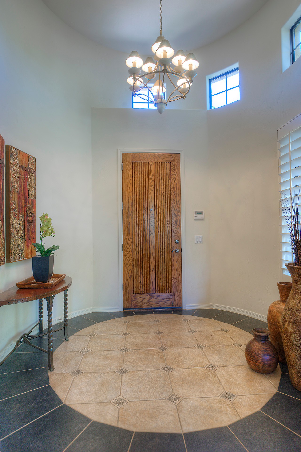 Bright rounded foyer at this Scottsdale home for sale located in DC Ranch at 9270 E Thompson Peak Pwky #320 Scottsdale, AZ 85255 listed by Don Matheson at The Matheson Team